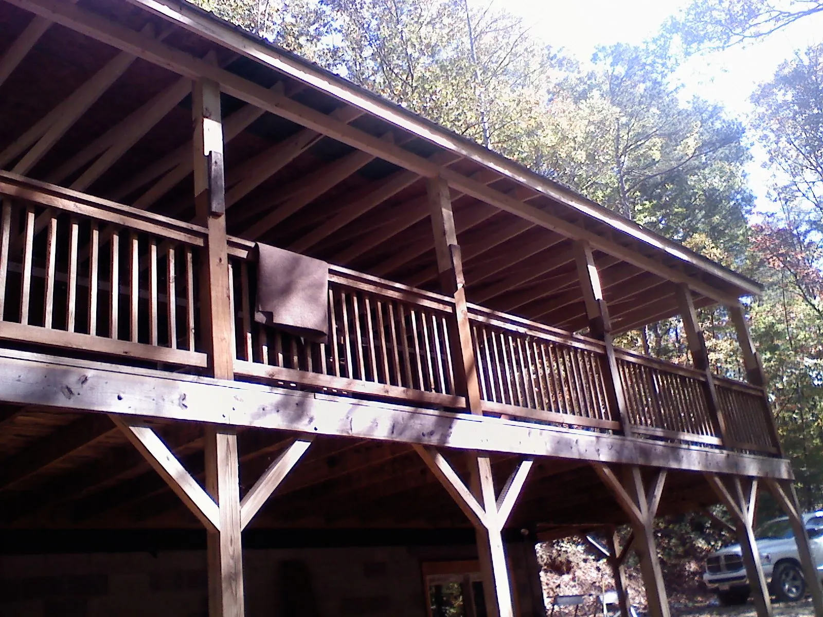 Timber framing under a new elevated porch and deck — Roof Leak Repair in Coin by Roofing Brothers